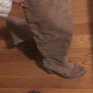Tan suede worn knee high heeled boots